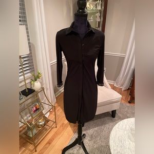 Beautiful black dress.  Great beaded detail on sleeve.